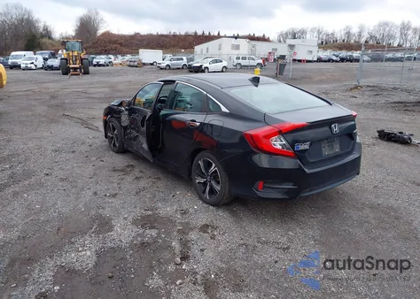 2017 Honda Civic Touring из США, поврежденный, VIN 2HGFC1F99HH653044